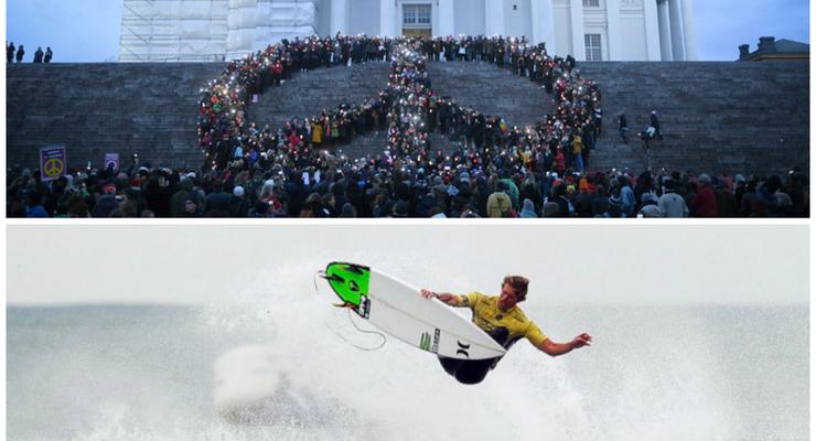День в фото: знак мира в Финляндии и серфер в Португалии