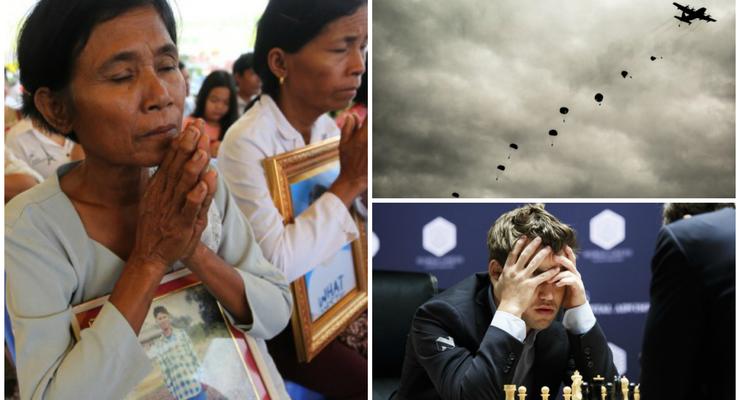День в фото: молитва камбоджийских женщин, прыжки парашютистов и шахматный ход