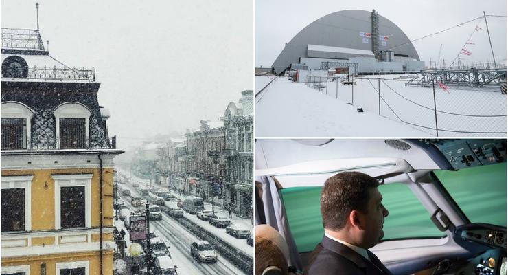 День в фото: Арка над ЧАЭС, снег в Киеве и Гройсман за штурвалом самолета