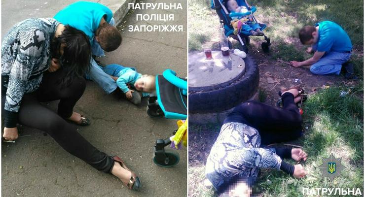 В Запорожье пьяные горе-родители уснули на траве рядом с кричащим ребенком в коляске
