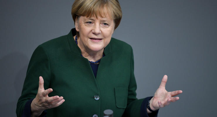 Меркель сожалеет о выходе США из парижского соглашения