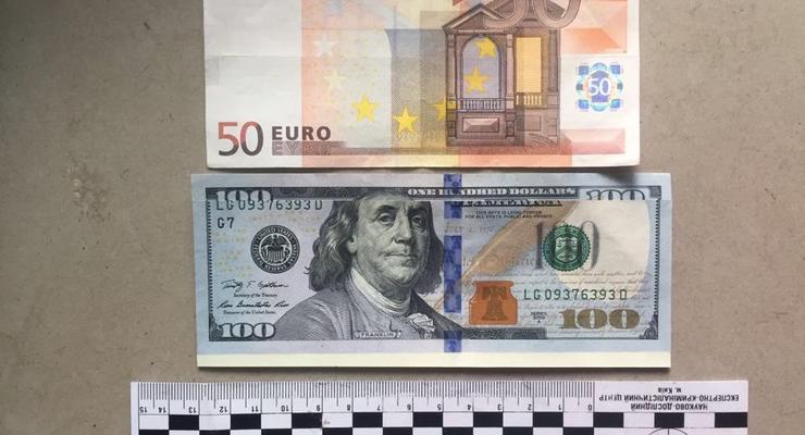 В киевских терминалах мошенники обменяли фальшивых $12000