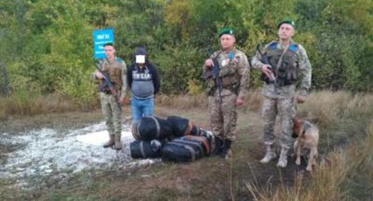 Луганские пограничники поймали российского контрабандиста шапок