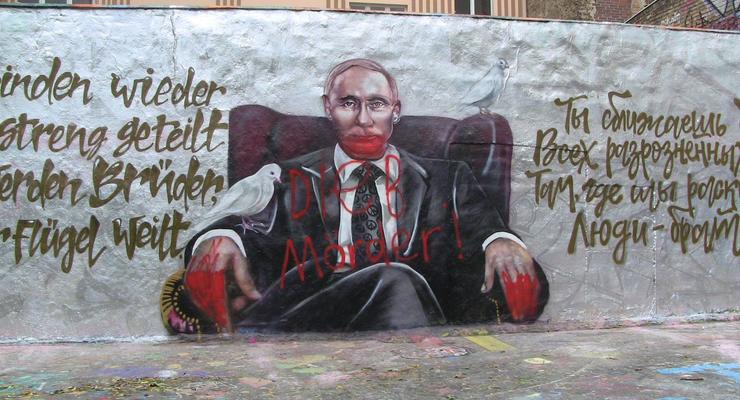 Немцы на граффити Путина написали "вор" и "убийца"