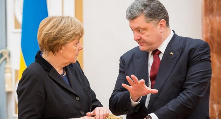 Порошенко обсудил с Меркель реализацию минских соглашений
