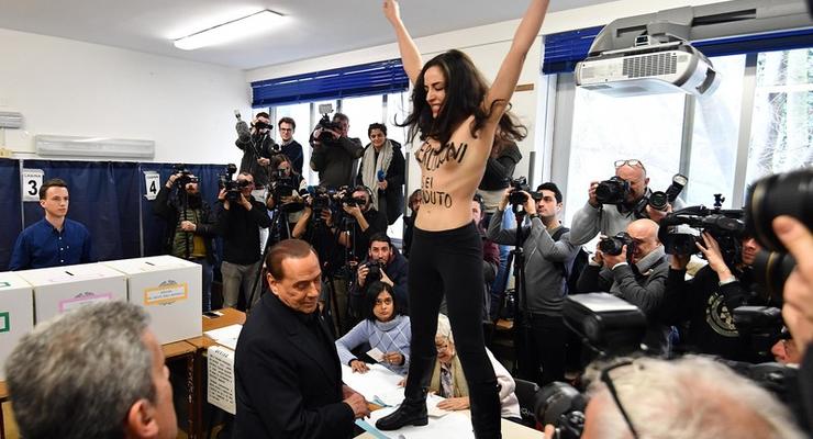 Femen попыталась помешать Берлускони проголосовать