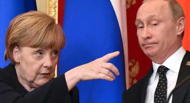 Меркель призвали потребовать освобождения Сенцова