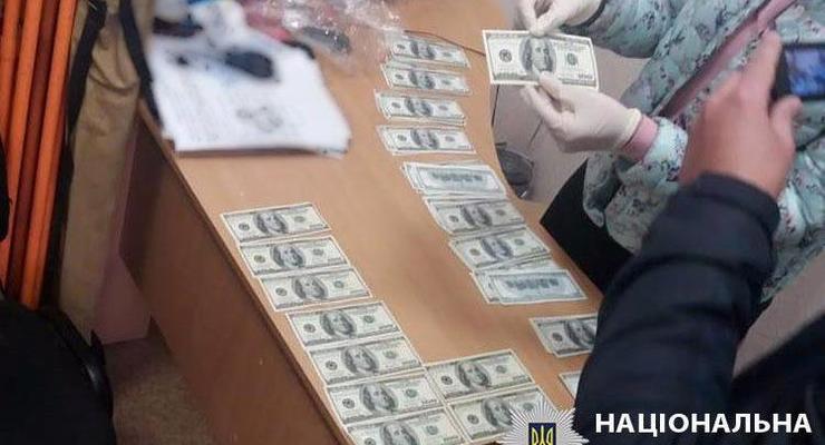 В Харькове за участок земли чиновник потребовал $24 тысячи