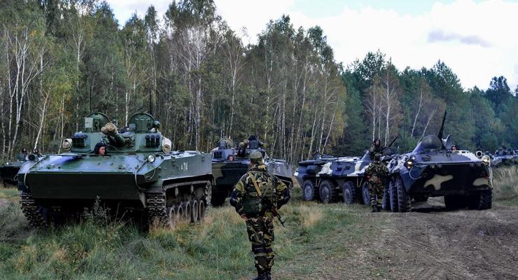 Боевики выдвинули за линии отвода сотни танков, орудий и артсистем