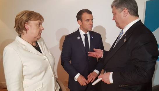 Порошенко, Меркель и Макрон обсуждают "выборы" в "ЛДНР"