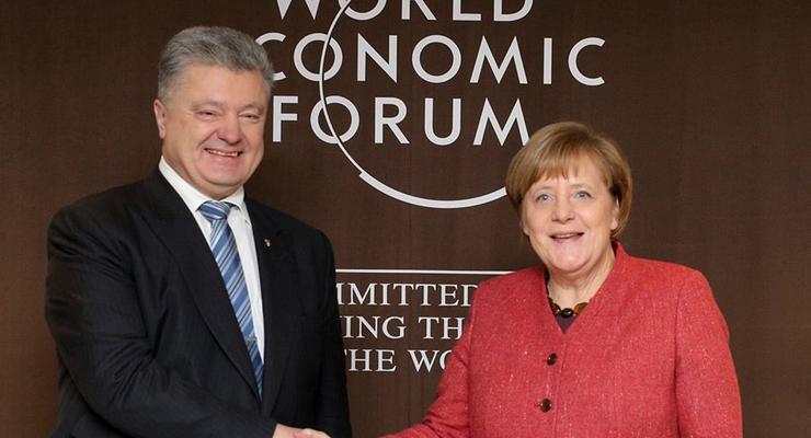 Порошенко начал переговоры с Меркель