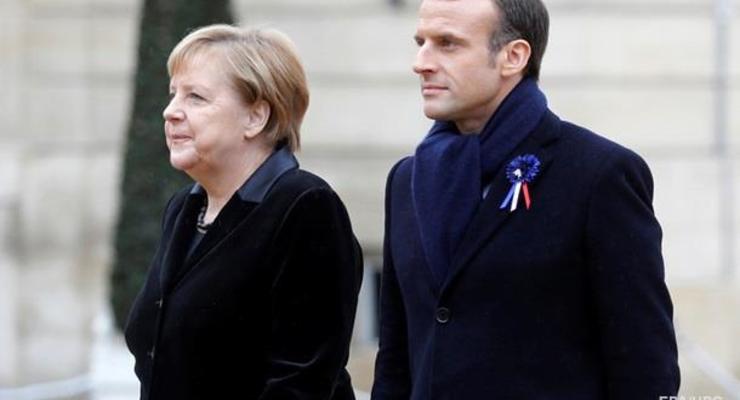 Макрон и Меркель обсудили ход минских соглашений