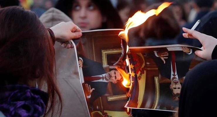 В Каталонии жгли портреты короля Испании, протестуя против его визита
