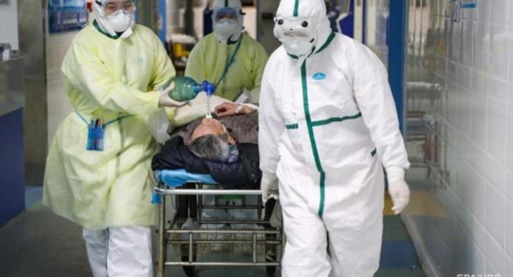 Число жертв коронавируса в Китае превысило 870
