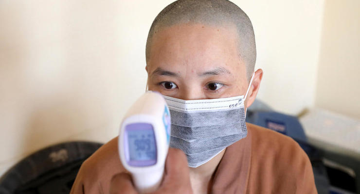 Число жертв коронавируса в Китае возросло