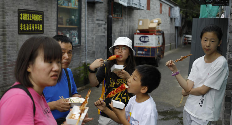 В Китае начнут штрафовать за переедание