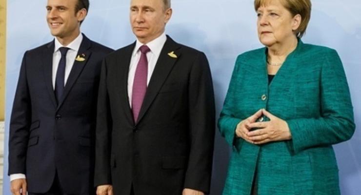 Макрон и Меркель провели переговоры с Путиным