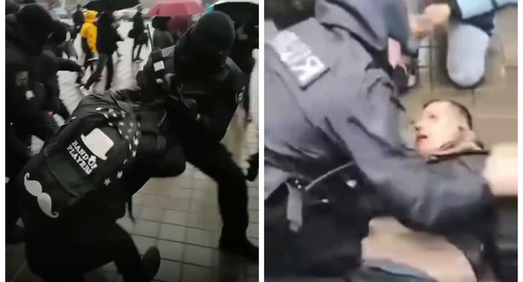 Полицейского, избившего антивакцинатора на митинге, отстранили
