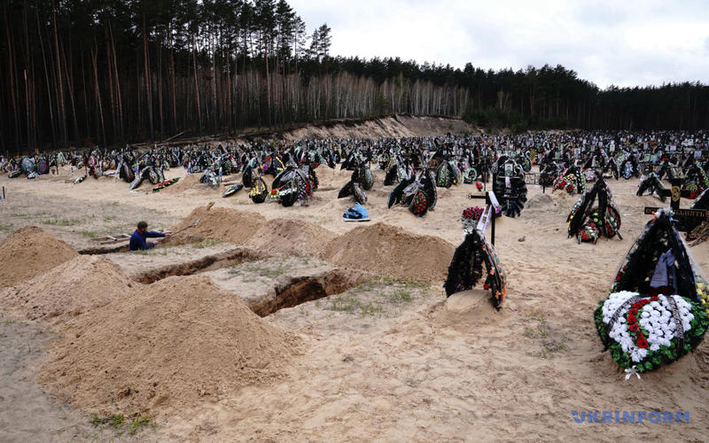 Фото кладбища в Ирпене с новыми могилами после российской оккупации. / Укринформ