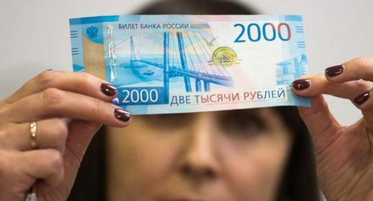 В Мелитополе жителям раздают фальшивые деньги - СМИ