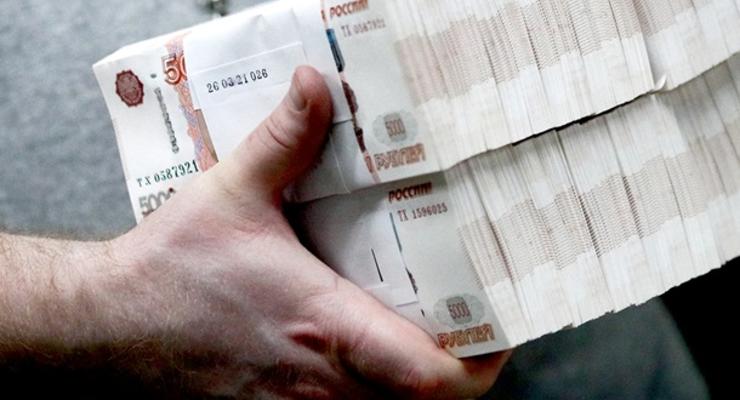 Уход иностранного бизнеса из РФ обваливает курс рубля - СМИ